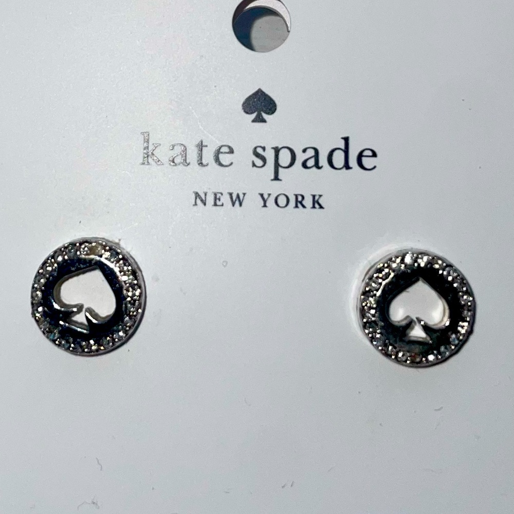 The Spade Pave Halo Spade Studs.